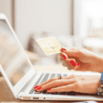 Early Amazon Prime Day Deals in June 2025: Save on Tech Buys Person using a laptop to shop online for tech deals.